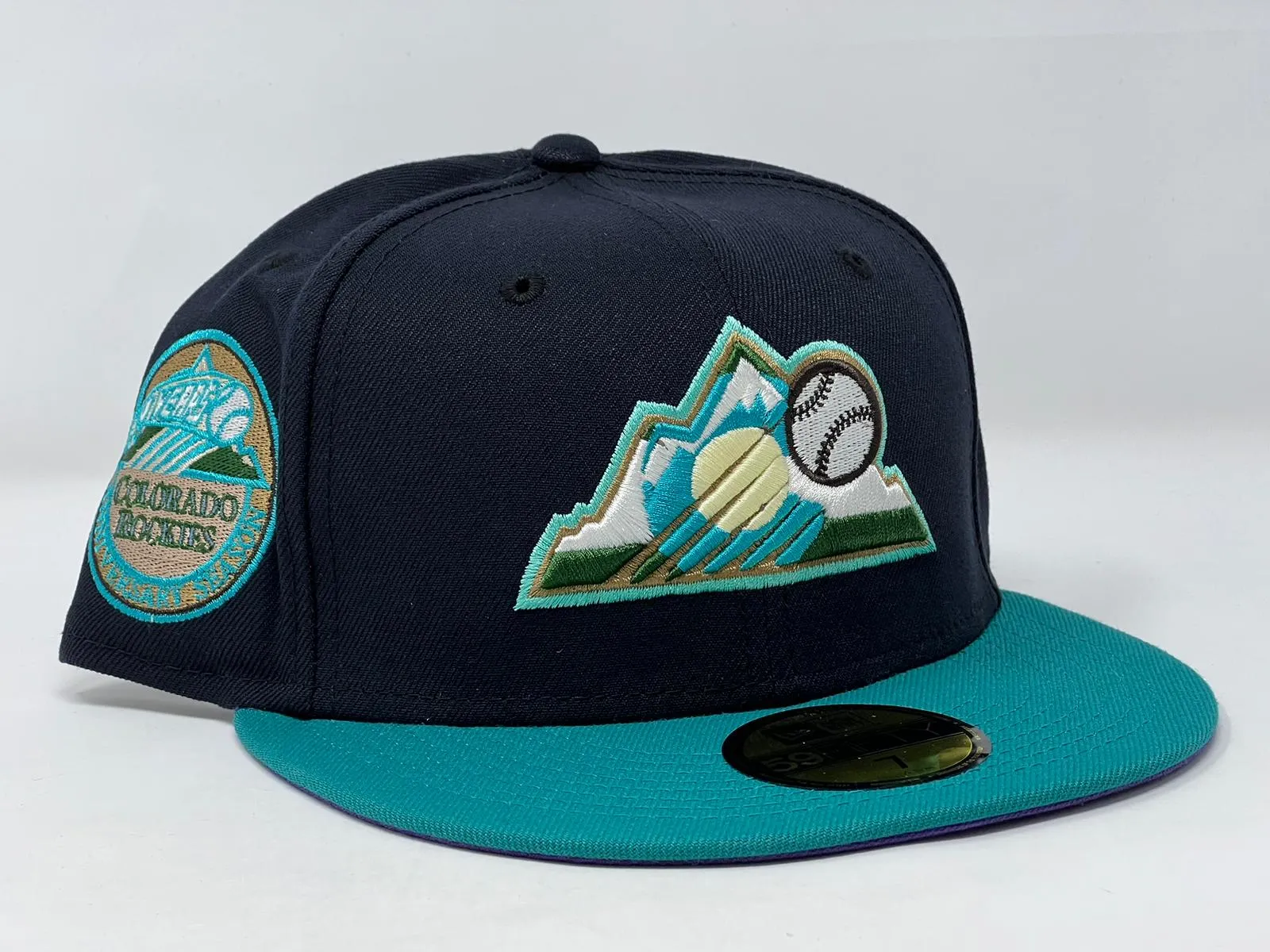 COLORADO ROCKIES 10TH ANNIVERSARY NAVY AQUA PURPLE BRIM NEW ERA FITTED HAT